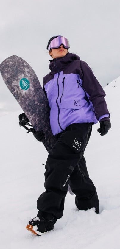 Snowboarder in the women's Burton [ak] Cyclic jacket