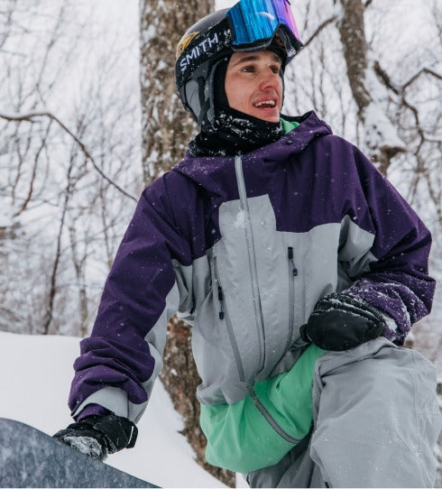 Snowboarder in the Burton [ak] Swash insulated jacket