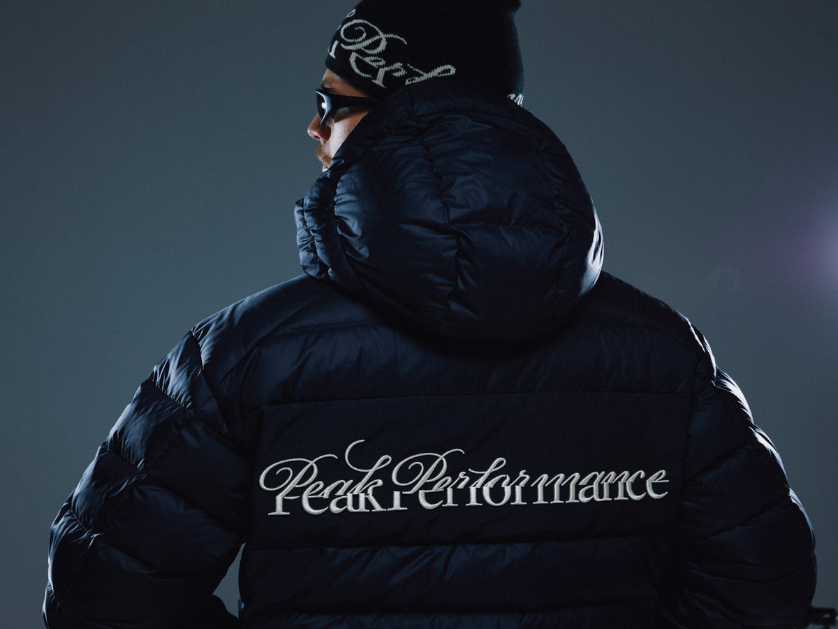The script embroidered across the back